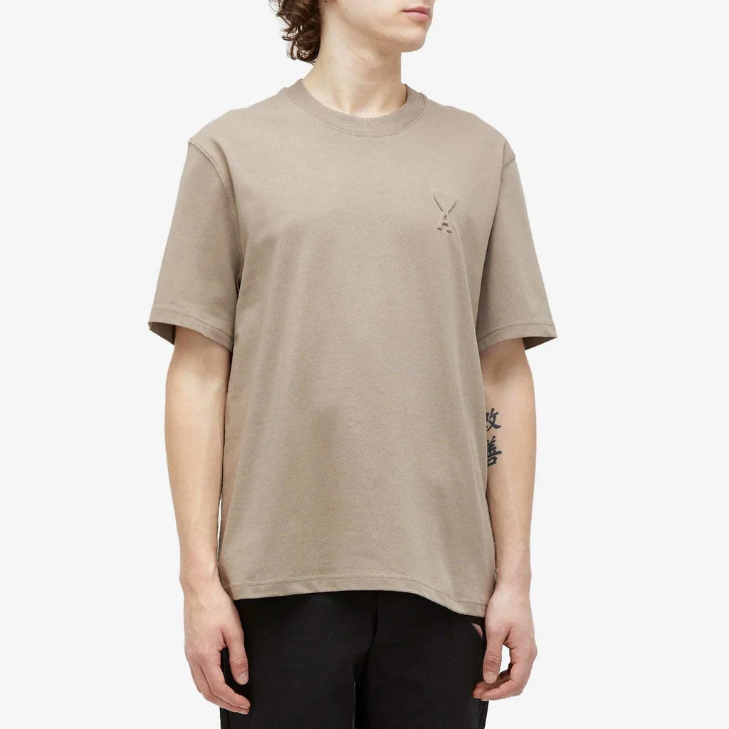AMI Paris Embossed Heart T Shirt in Light Taupe