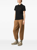 Black cotton polo shirt with Ami de Coeur print