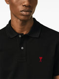 Black cotton polo shirt with Ami de Coeur print