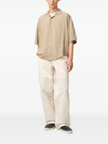 Short-sleeved shirt with embroidery.