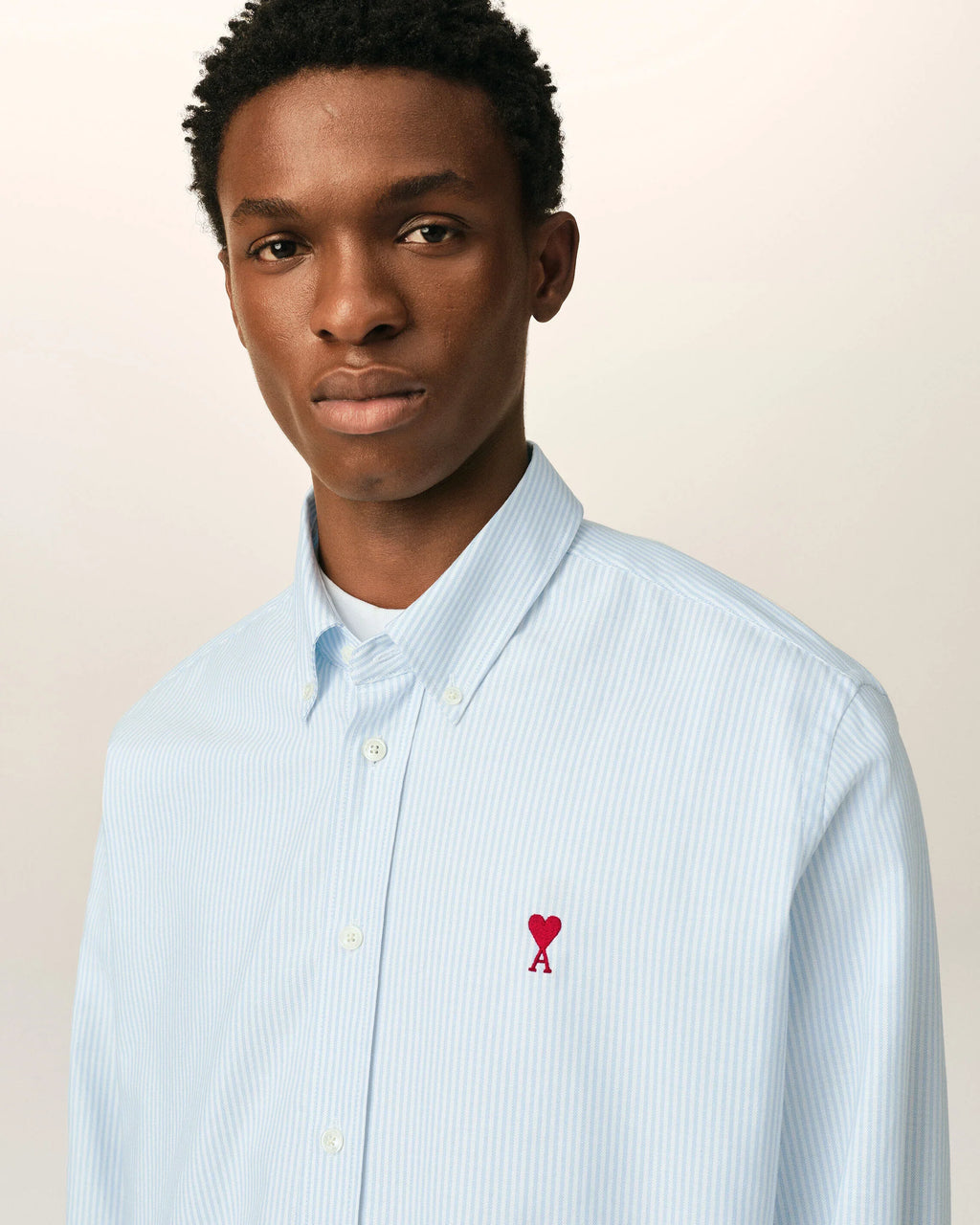 Blue stripped cotton shirt with Ami de Coeur