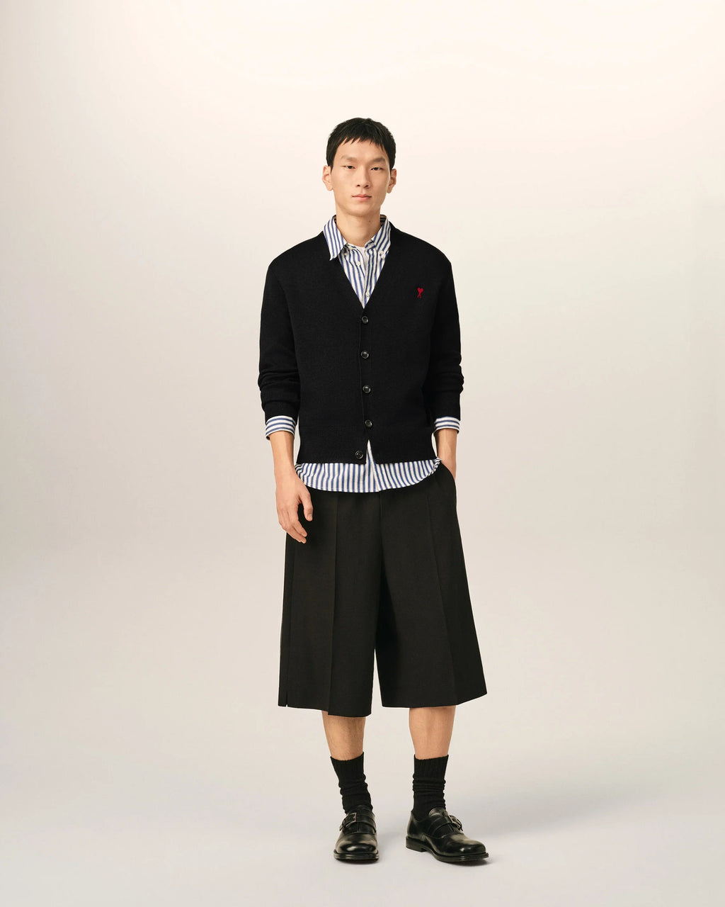 Black V neck wool cardigan with Ami de Coeur