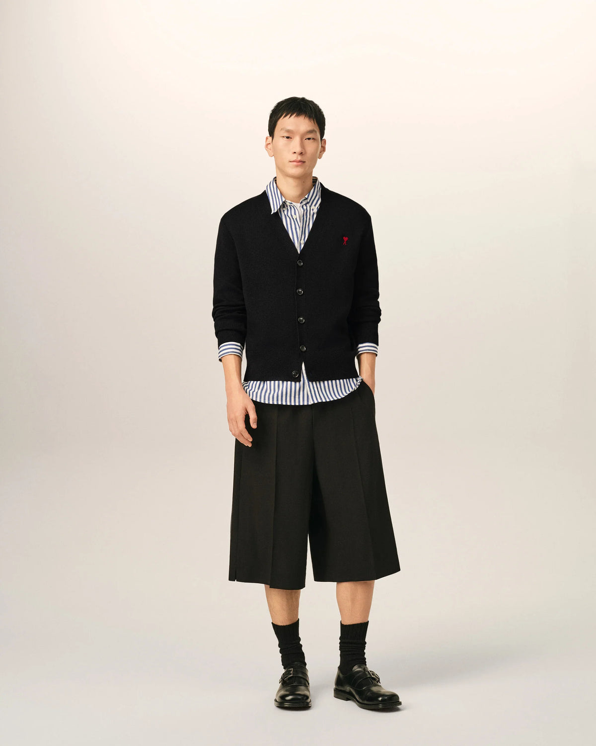 Black V neck wool cardigan with Ami de Coeur